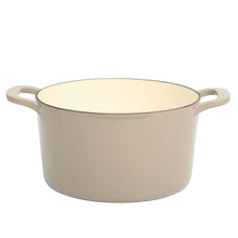 Enamel cast iron Dutch oven with lid, light taupe, side handles.