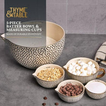 5-piece ceramic mixing and measuring bowl set with black dot pattern and gold-accent handle