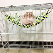 Hanging rope climbing net toy with bright blue and yellow braided cords