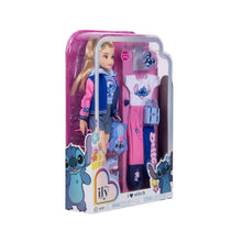 Disney Ily fashion doll with pink and blue jacket, denim shorts, and blue shoes.