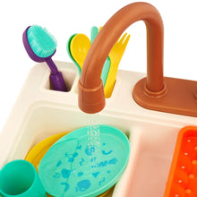 Toddler plastic sink set with brown faucet, colorful brushes, and teal dish