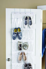 Over-the-door shoe organizer with clear pockets holding multiple pairs of shoes