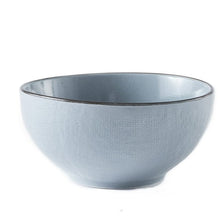Denim blue stoneware cereal bowl with wide rim and smooth glossy interior