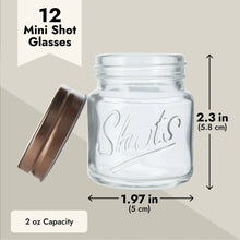 Mini mason jar shot glass with copper lid, clear glass, open side view
