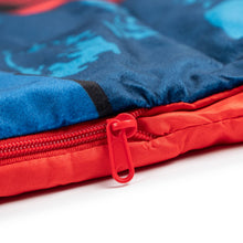 Sleepover blanket zipper detail, red zip on blue fabric