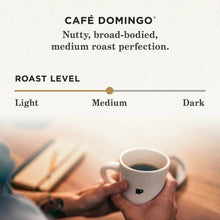 Café Domingo roast level graphic with cup and medium roast scale