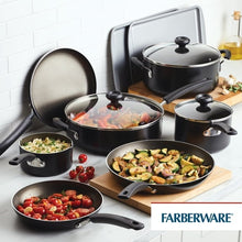 Black nonstick cookware set with multiple lidded pans and a griddle on counter