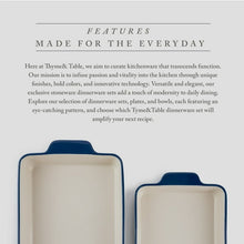 Stoneware baker pair with blue side handles and white interior