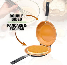 Double-sided pancake and egg pan opened to show a cooking surface