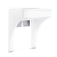 White outlet shelf front with gray cord storage cutout and curved side openings