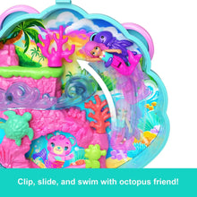 Ocean-themed compact playset interior with slide, coral shapes, and small figures
