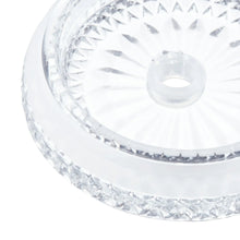 Close-up of textured glass lid for a ribbed glass tumbler.