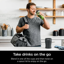 Personal blender with clear jar and compact base for to-go cup drinks