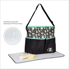 Black monkey-print zip-top diaper tote with mint trim and included changing pad