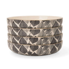 Stoneware low bowls set of 4 with gray leaf pattern on cream, side view