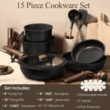 Black nonstick cookware set laid out: pans, saucepans, lids, utensils, and pan protector