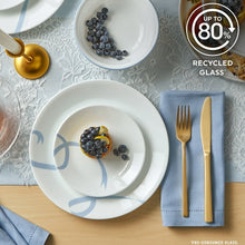 White glass dinner plate and bowl with light blue ribbon vine pattern and blueberries