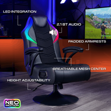 Black gaming chair with RGB trim, mesh back panel, and padded armrests