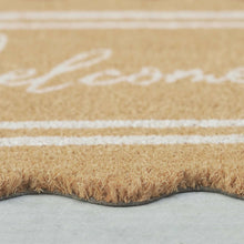 Coir doormat texture with white border stripe and partial 'Welcome' script