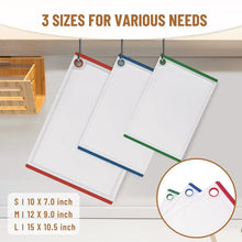 Set of three large plastic cutting boards with multicolor borders and corner handle holes