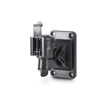 Trail camera flex mount bracket, dark metal, screw holes on square mounting plate