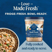 Refrigerated dog food tub with bowl of chunky chicken stew, peas & carrots