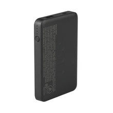 Black portable power bank back with printed label and a circular button