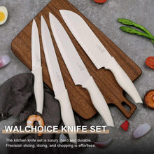 Set of white kitchen knives with handles, laid out on a wooden cutting board