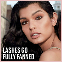 Mascara-enhanced, fully fanned eyelashes on a model