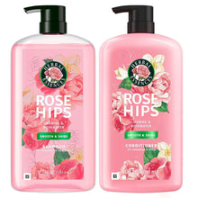 Herbal Essences Rose Hips shampoo and conditioner bottles, pink and transparent, two-pack