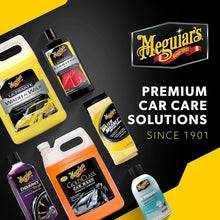 Car care bottles and microfiber cloth display in yellow and black packaging