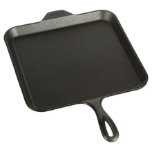 Square cast iron griddle with side handle and ridged edges, dark finish