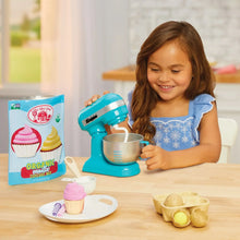 Pretend baking sand set with blue mixer, bowl, and cupcake molds on table