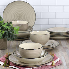 Cream stoneware dinnerware set with bowls and plates, speckled swirl texture