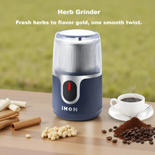 Blue cordless herb grinder with clear top and red indicator light