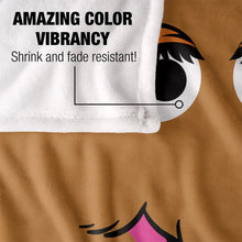Close-up tan throw blanket with Snuffleupagus face and pink tongue detail
