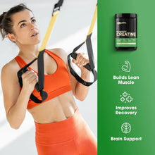 Athlete in orange workout wear with Optimum Nutrition Micronized Creatine Powder bottle