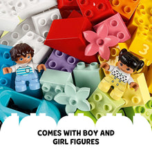 Colorful LEGO DUPLO bricks with boy and girl figures