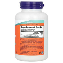 Magnesium citrate supplement bottle with blue cap and Supplement Facts label