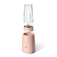Rose personal blender with clear jar on base and exposed blade in center compartment