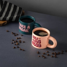Stoneware mugs with coffee: dark green “Take a Break” and pink “Self Love Club”