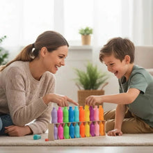 Children arranging multicolor bottle pieces on a board game mat during play