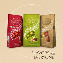 Assorted Lindor truffle bags in red, green pistachio, and tan flavors