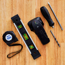 TV wall mount toolkit tools on wood: stud finder, tape measure, screwdriver, drill bits