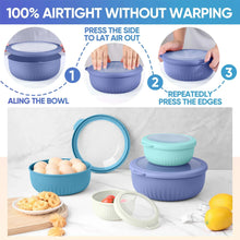 Blue nesting plastic mixing bowls with matching lids, stackable for kitchen prep