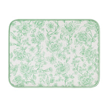 Rectangular green dish drying mat with white floral pattern and stitched border
