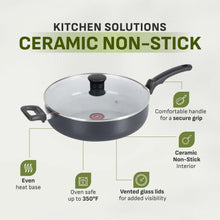 Black ceramic non-stick jumbo cooker sauté pan with vented glass lid and knob handle