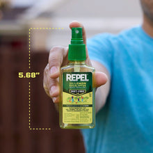 Lemon eucalyptus DEET-free insect repellent spray bottle held up, green sprayer