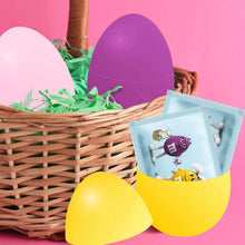 Fun Size chocolate candy wrappers in wicker basket with Easter eggs