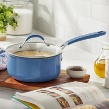 Blue sauce pan with stainless lid and long handle